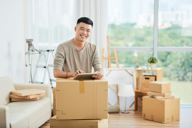 young man just moved into a new apartment