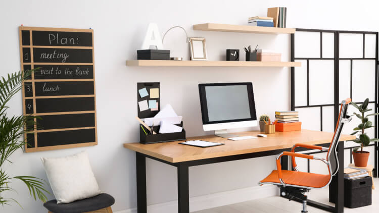 home office with chalkboard on wall