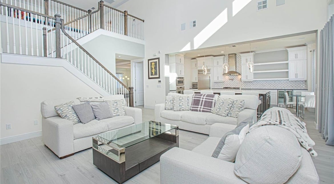 white living room inside a house for rent in Orlando