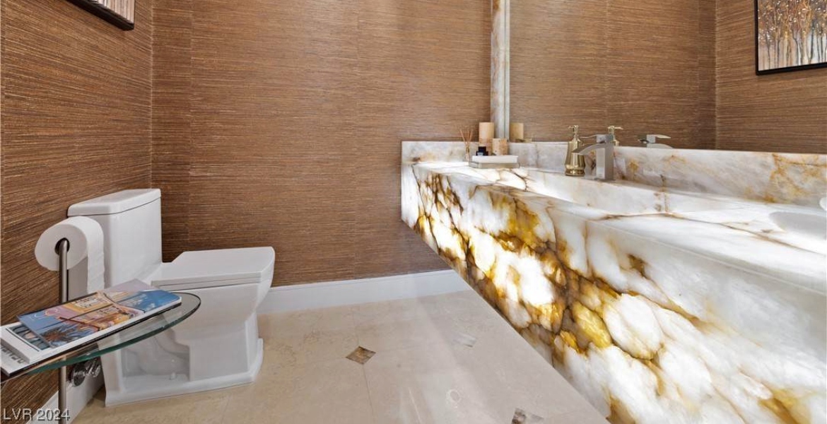 beautifully decorated bathroom with marble countertop in a las vegas house for rent