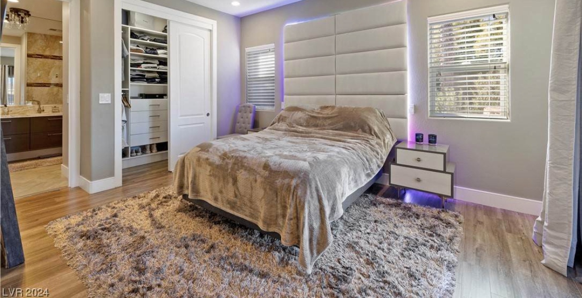 cozy bedroom with furs in a las vegas house for rent