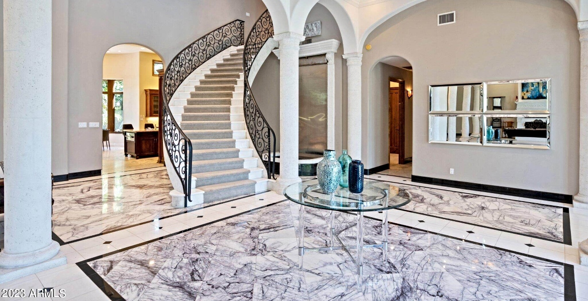grand entrance with staircase in a Phoenix rental house