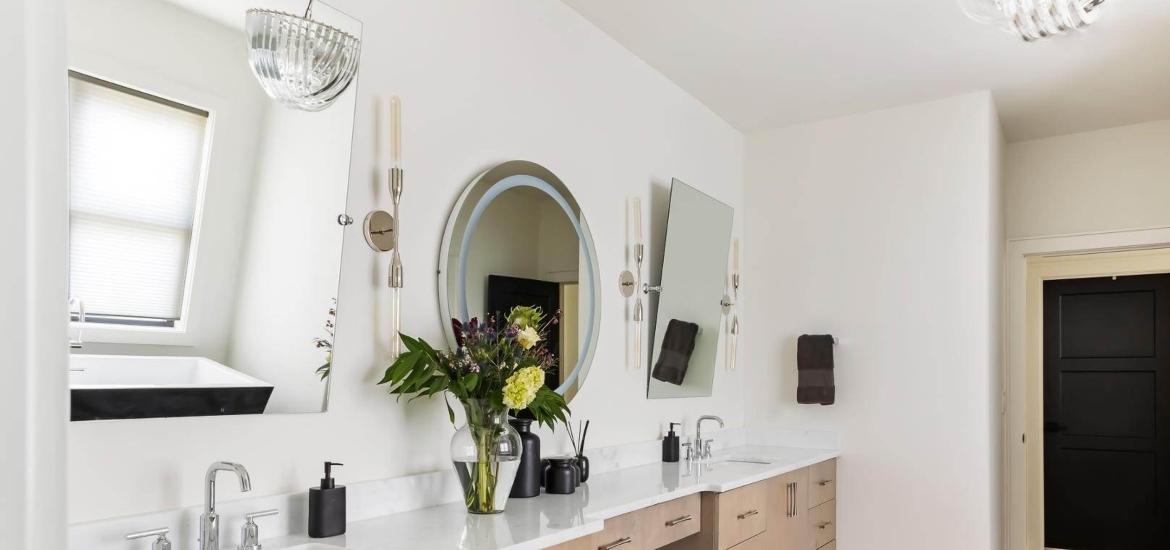 vanity with large countertop in a luxurious bathroom of a rental house in raleigh NC