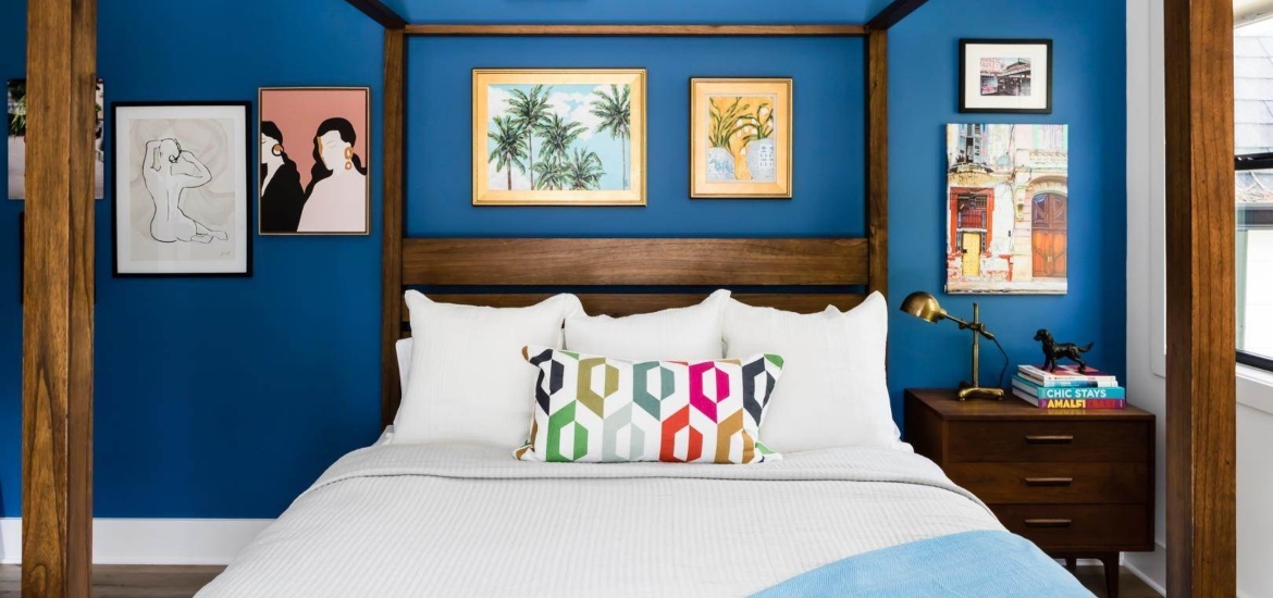 colorful bedroom with artwork in a luxurious rental house in raleigh NC