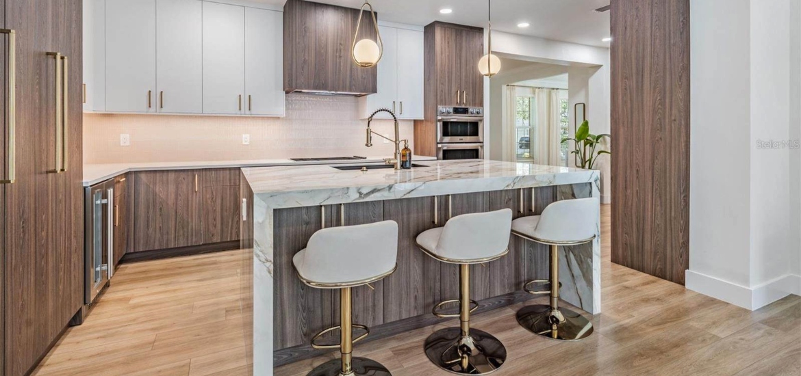 modern kitchen with appliances in a rental house in tampa