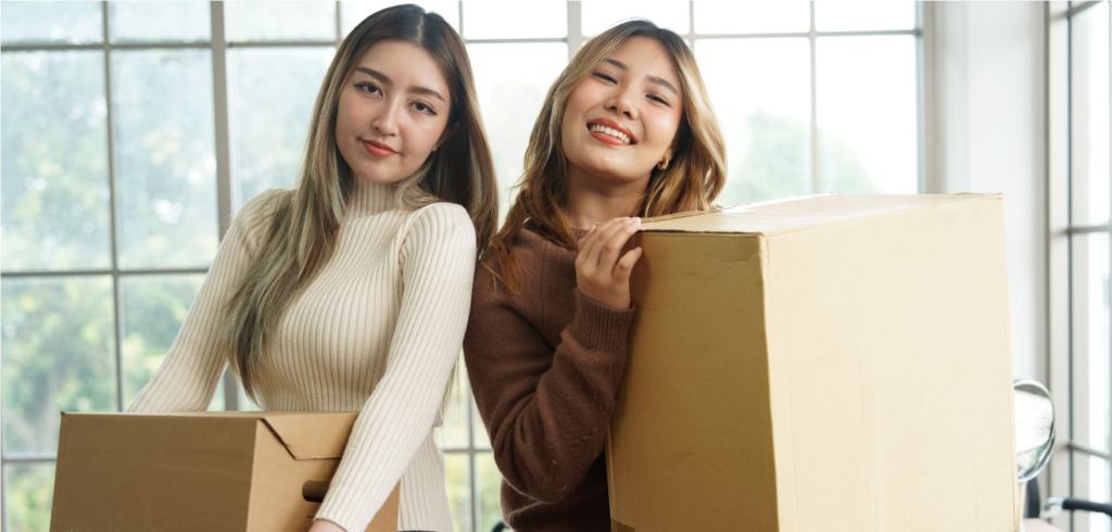 two young girls moving
