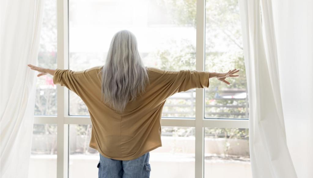 A Rental of One’s Own: Canadians 65+ Make Up One-Third of Country’s Solo Renters woman looking out the window