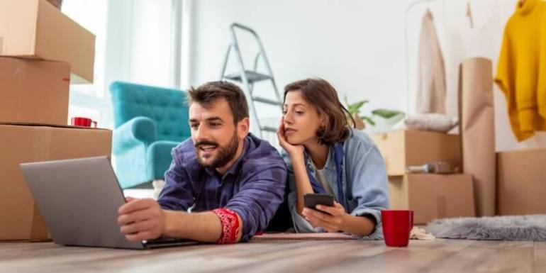  couple of renters browsing for rental properties looking for a house for rent together 